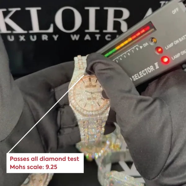 Two Tone AP Moissanite Diamond Watch being tested for durability with diamond tester.