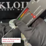 Moissanite diamond watch showcase with diamond tester showing positive result, passes all diamond tests with Mohs hardness scale 9.25.