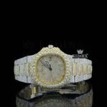 Patik Philippe Automatic Tourbillon Watch with yellow dial and diamond markers, showcasing luxury design.