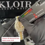 Roles Day-Date Mother of Pearl Dial Moissanite Diamond Watch showcased with diamond tester reading Mohs scale 9.25.