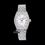 Roles Roman Numerals White Dial Date Display Full Iced Out Moissanite Watch with 14K gold plating and sparkling stones.