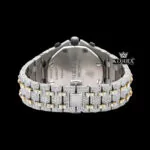 Back view of a luxurious two tone AP diamond watch featuring a silver and yellow gold bracelet.