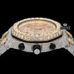 Close-up of a Two Tone AP moissanite diamond watch with 14K gold accents and a sparkling diamond bezel.