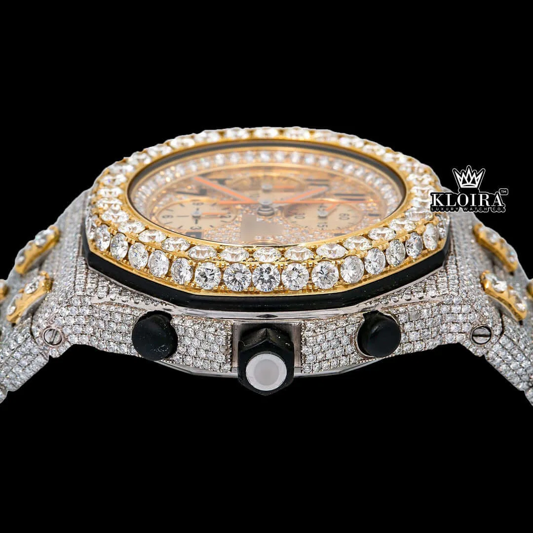 Close-up of a Two Tone AP moissanite diamond watch with 14K gold accents and a sparkling diamond bezel.