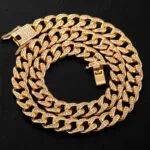 Moissanite Cuban Link Chain in luxurious 14K Yellow Gold featuring 10mm round stones, stunning design