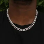 Neck View of 14mm Round Moissanite Cuban Link Chain Crimson in 14K White Gold