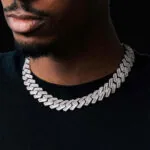 18mm Round Moissanite Cuban Link Chain ShineWeave in 14K White Gold Closeup Neck