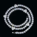 Moissanite Tennis Chain Heartora in 14K White Gold featuring stunning round cut stones