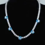 5mm Round Moissanite Tennis Chain Skullshine in 14K White Gold Closeup Neck